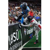 Ryan McDaniel of the Philadelphia Soul up against the Boards